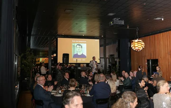 Audience at an evening presentation
