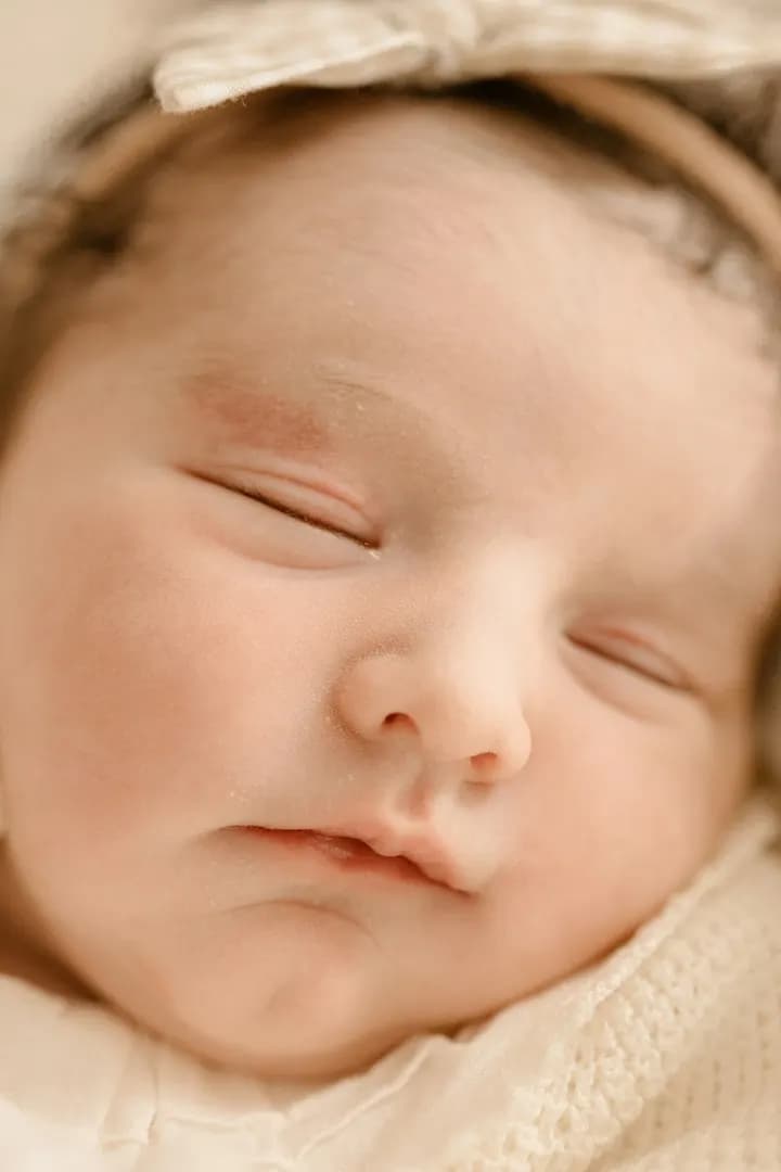 Sleeping newborn in soft light