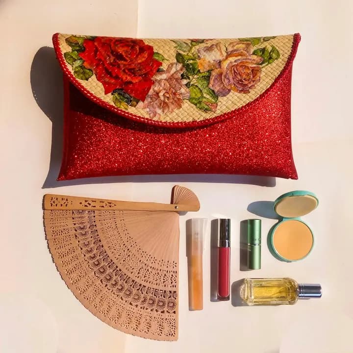 Cosmetics arranged in a colorful flat lay